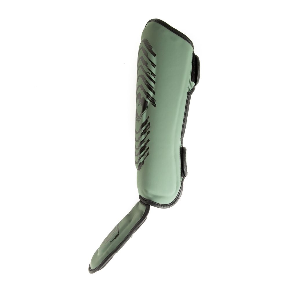Booster kinder scheenbeschermers elite groen 
